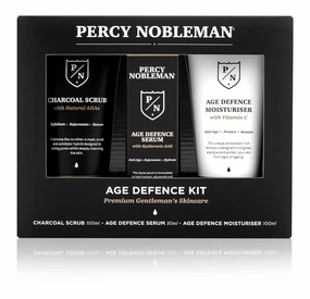 Age Defence Kit, a men's skincare set containing Charcoal Face Scrub (with Natural AHAs), ultra-hydrating Facial Serum (with Hyaluronic Acid), and Moisturiser (with Vitamin C)